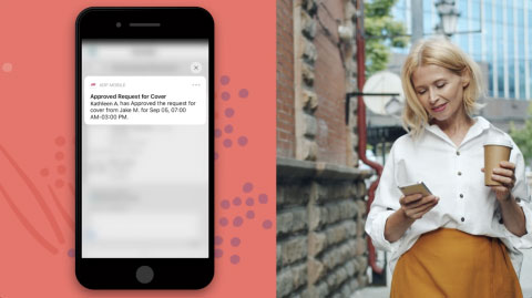 Female employee checking her mobile phone which displays an ADP Workforce Manager notification for Approved Request for Cover