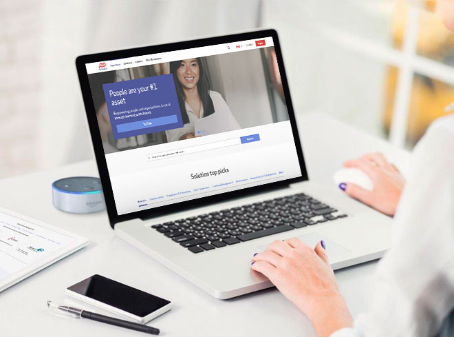 ADP Workforce Now client using the platform on a laptop